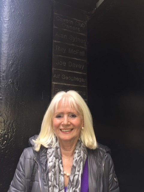 Debbie by her father's brick at the Cavern